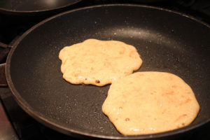 Healthy carrot cake pancakes cooking
