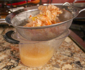 Simply the Best Shrimp Scampi Zoodles Straining Stock