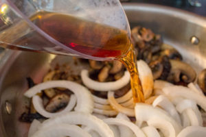 Adding Marsala wine to mushrooms