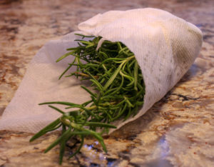 Rosemary wrapped loosely in paper towel