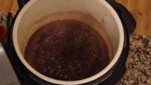 Ninja Foodi Ribs Raspberry Sauce boiling