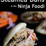 Asian Steamed Buns filled with Asian Pulled Pork and pickled vegetables