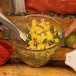 Mango salsa in bowl for Mexican Manicotti