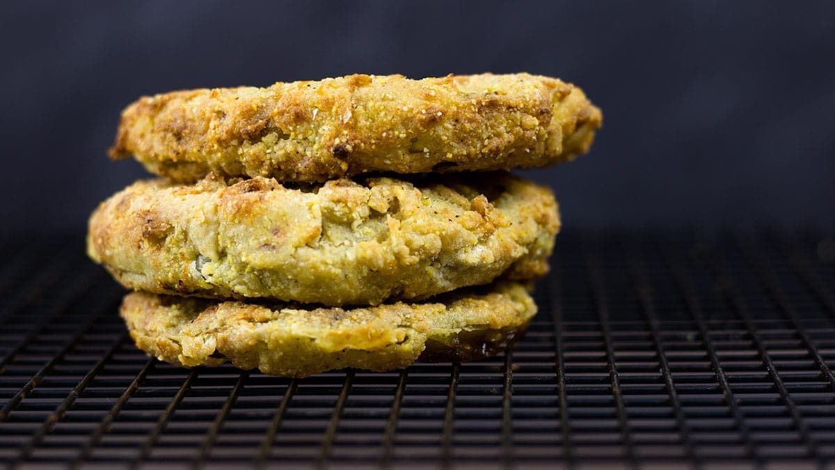 3 Fried green tomatoes on a cooling rack