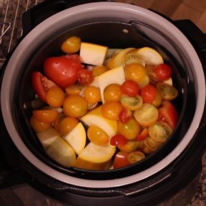 cut up vegetables in the basket of the ninja foodi
