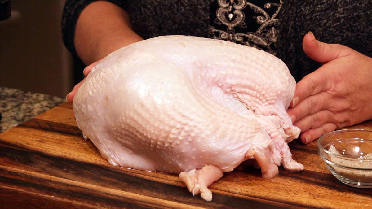 6 pound raw turkey on a cutting board