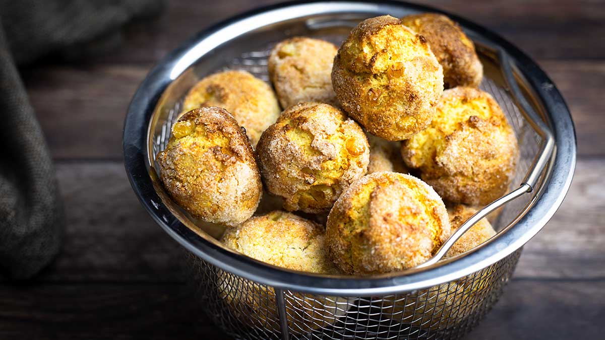 hushpuppies sitting in a metal basket with holes