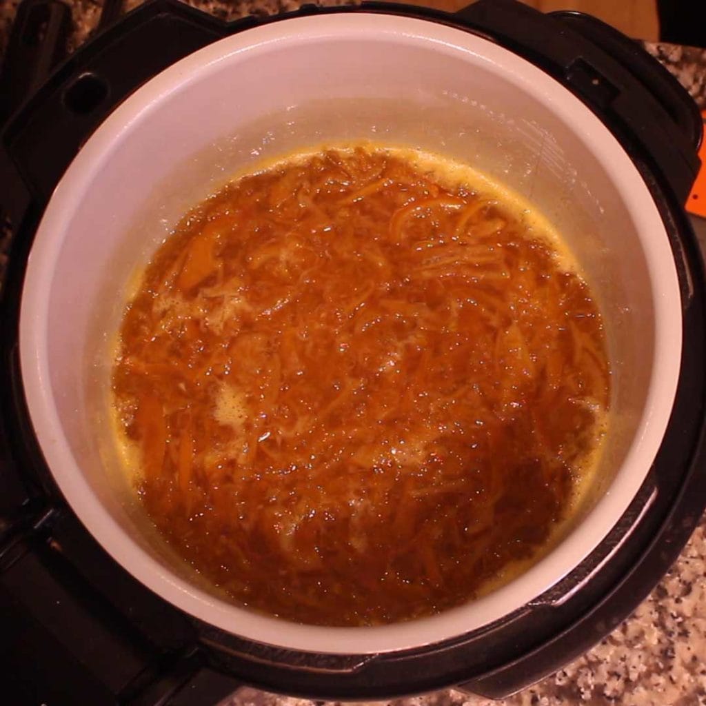 Showing what the orange marmalade looks like after boiling