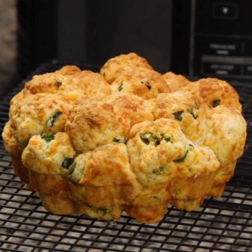 Jalapeno cheddar pull apart bread on a cooling rack