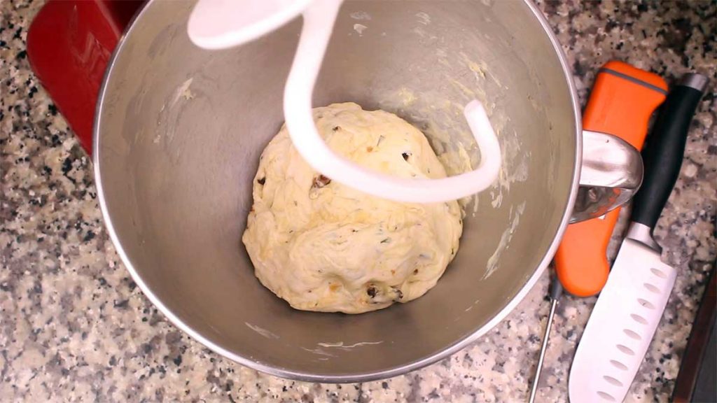 dough in the mixer after adding olive oil
