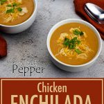 two bowls of creamy chicken enchilada soup with red napkins and spoons