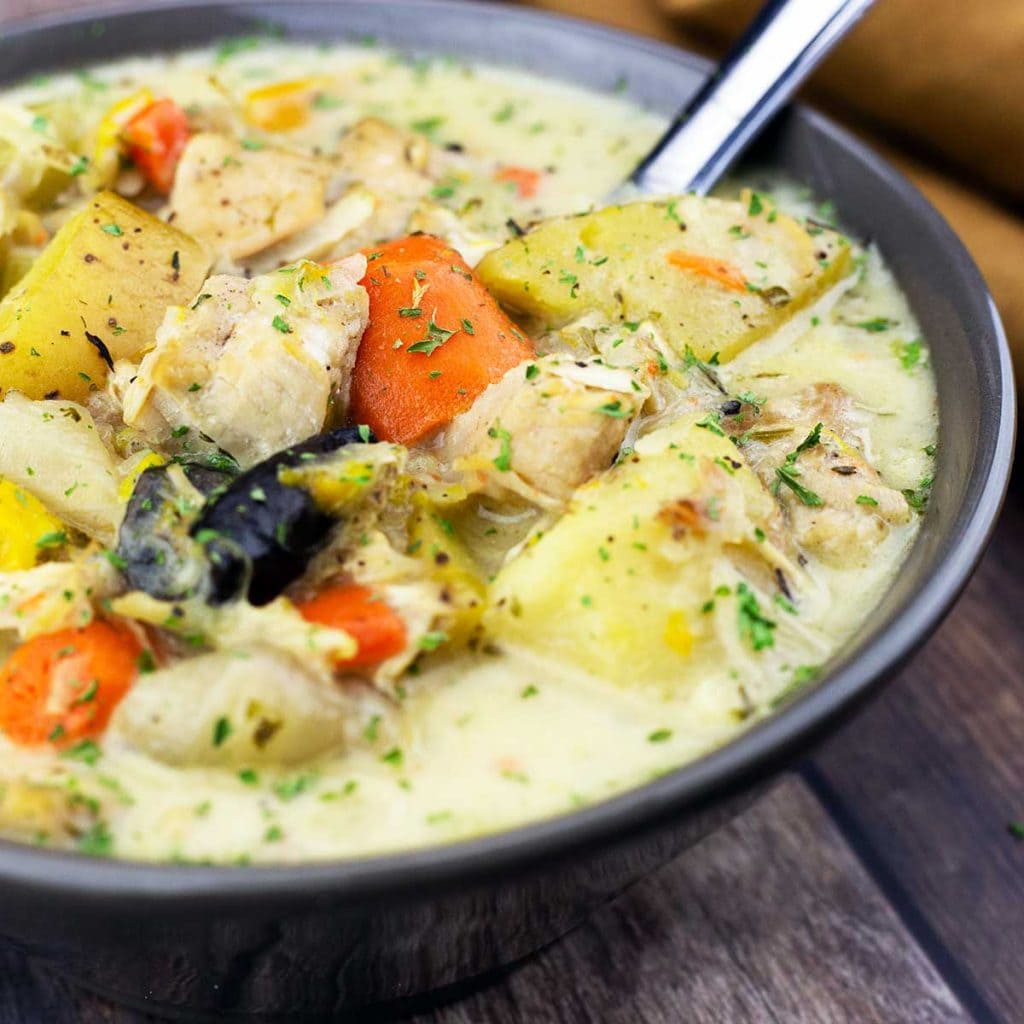Chicken Stew in a bowl with a spoon