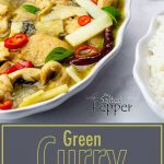 green curry chicken in a white bowl next to a bowl of rice