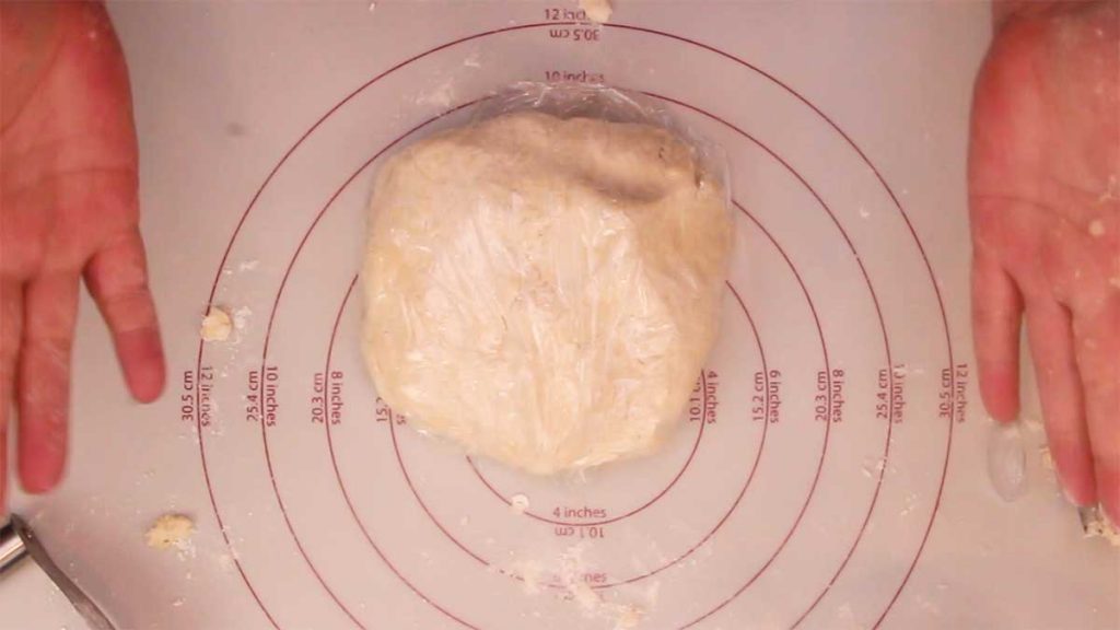 homemade pie crust wrapped in plastic