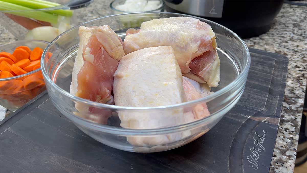 bowl of raw chicken thighs 