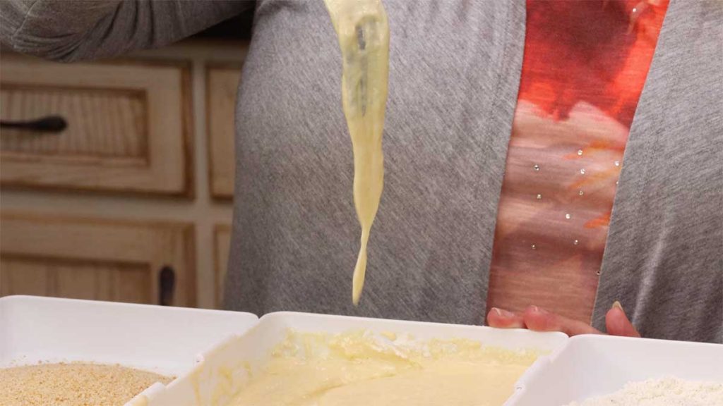 showing the consistency of the wet batter