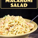 Hawaiian macaroni salad in a yellow bowl with a serving spoon with the text overlay of hawaiian macaroni salad