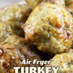 air fryer turkey meatballs in a blue bowl with writing that says Air Fryer Turkey Meatballs and The Salted Pepper