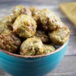 air fryer turkey meatballs stacked in a blue bowl