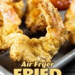 air fryer fried shrimp on a platter with cocktail sauce