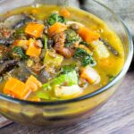 vegetable lentil soup in a glass serving bowl