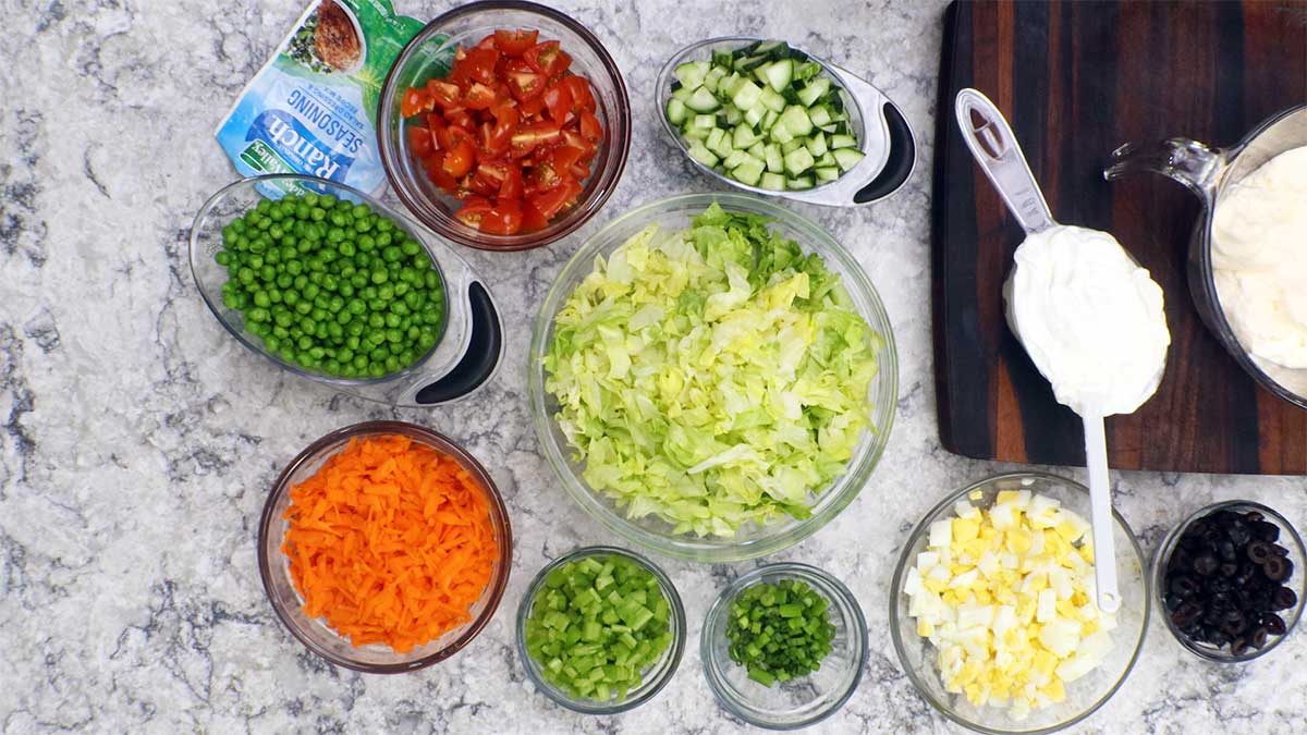picture of all the ingredients in the layered salad.