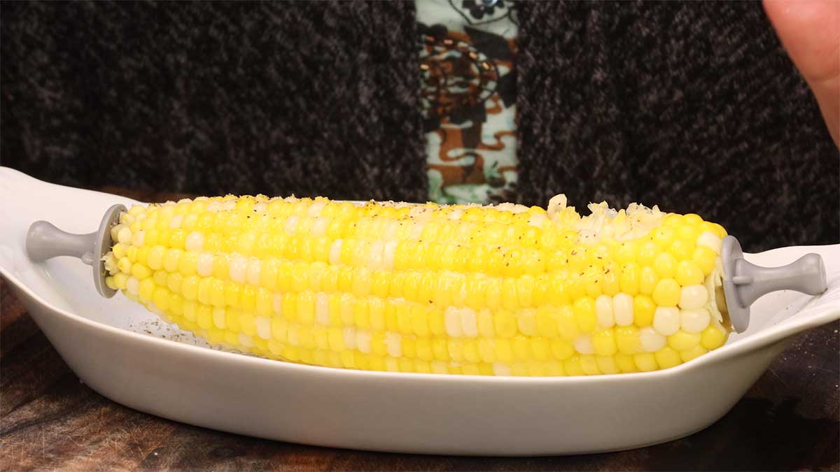 finished corn seasoned with butter, salt, and pepper.