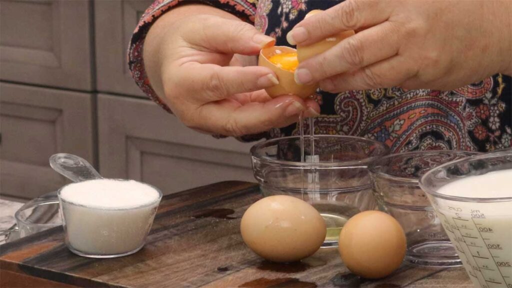 separating the egg yolks from the whites.