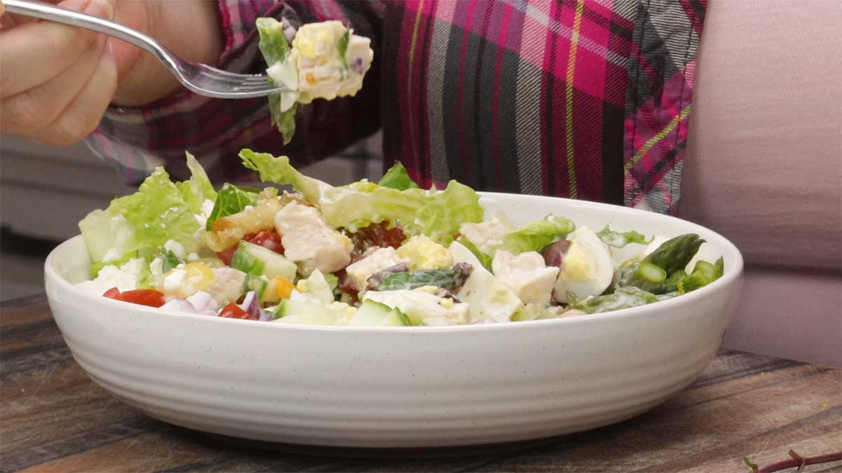 eating Mediterranean Chopped Salad.