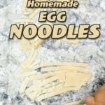 Homemade egg noodles on counter.