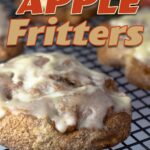 air fryer apple fritters glazed on cooling rack.