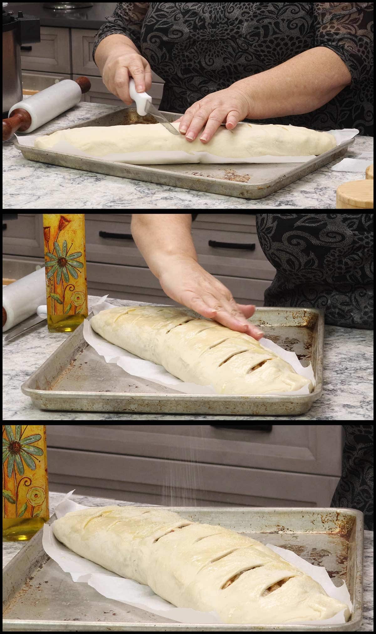 stromboli on parchment lined tray and cutting slits in top