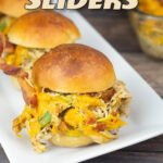 Chicken Bacon Ranch Sliders on a plate with extra buns and mixture beside it.