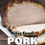 Ninja Foodi Pork Roast sliced on a white platter.