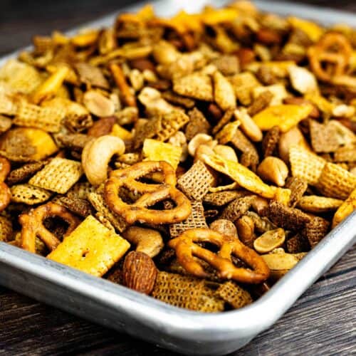 Air fryer Chex mix on a tray.