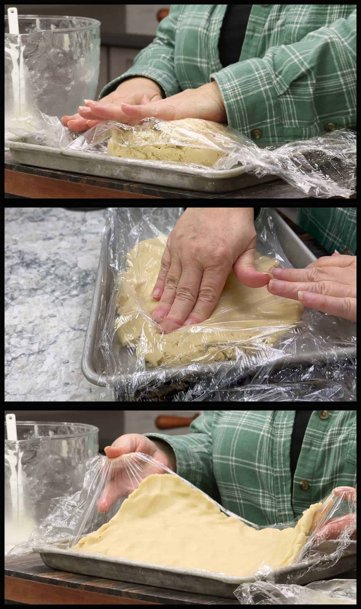 Pressing the cookie dough into the rectangular pan. 
