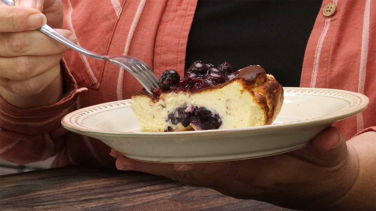 eating the blueberry basque cheesecake.