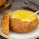 cheddar broccoli soup in a bread bowl.