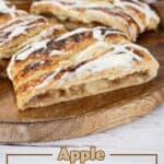 Apple Puff Pastry cut on a wooden board.