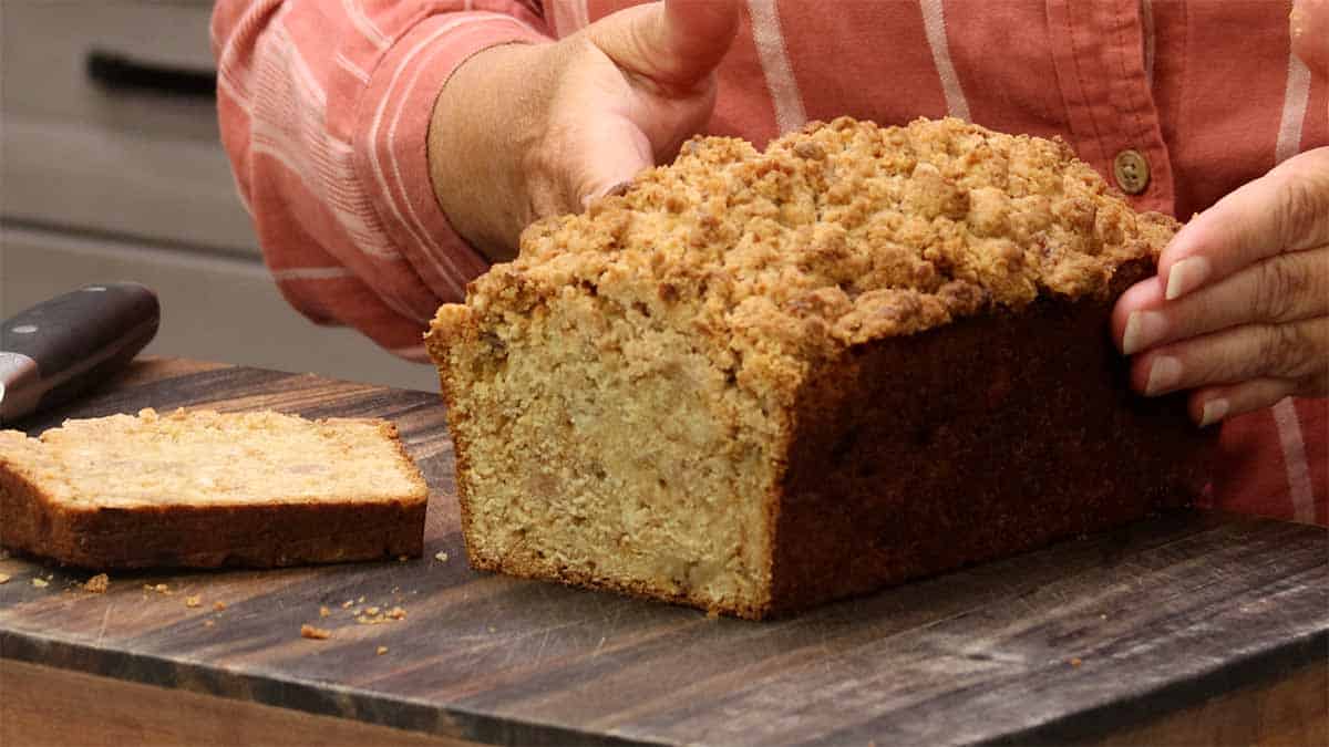 cut banana bread showing inside and slice.