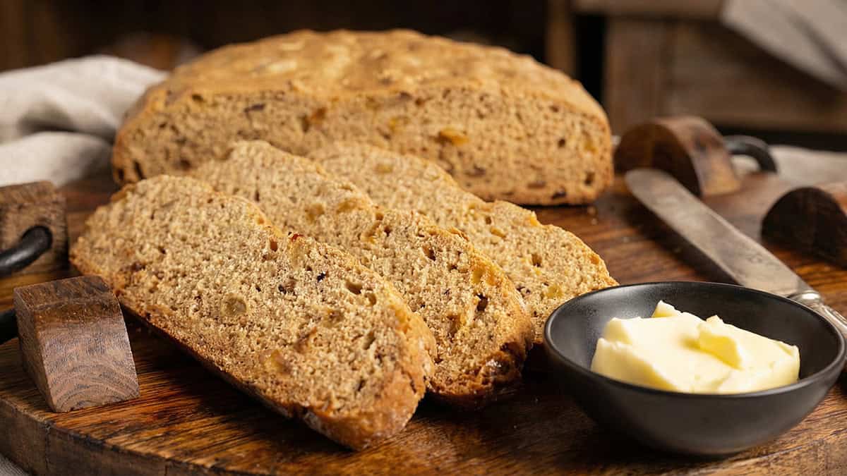 Cinnamon Raisin Quick Bread sliced on a platter