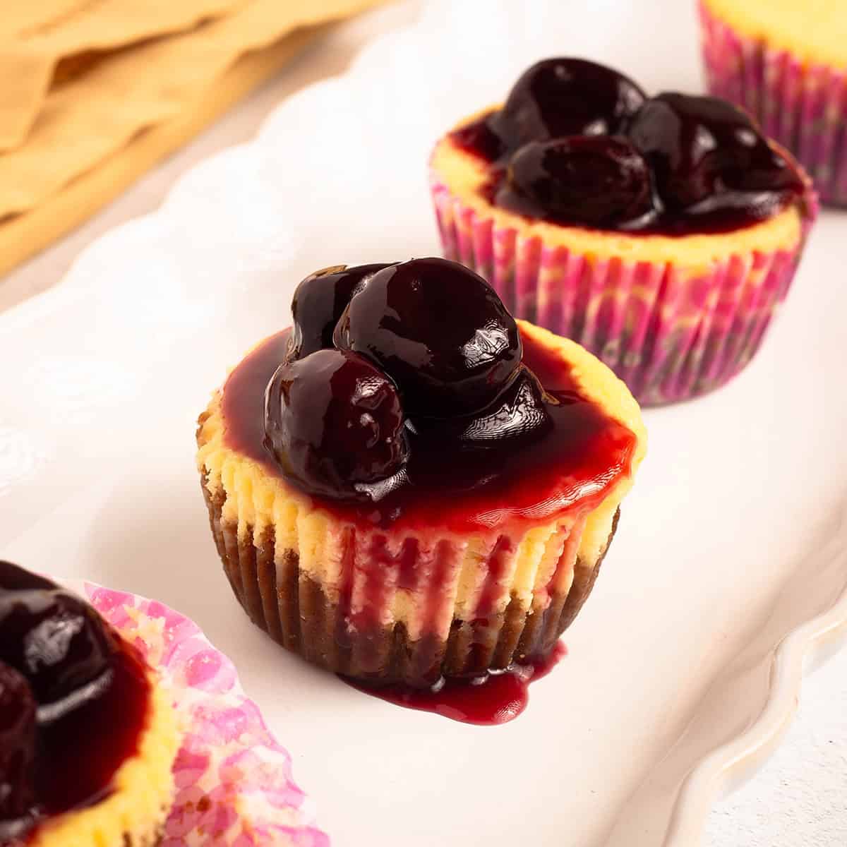 Mini cherry cheesecakes square image for social media